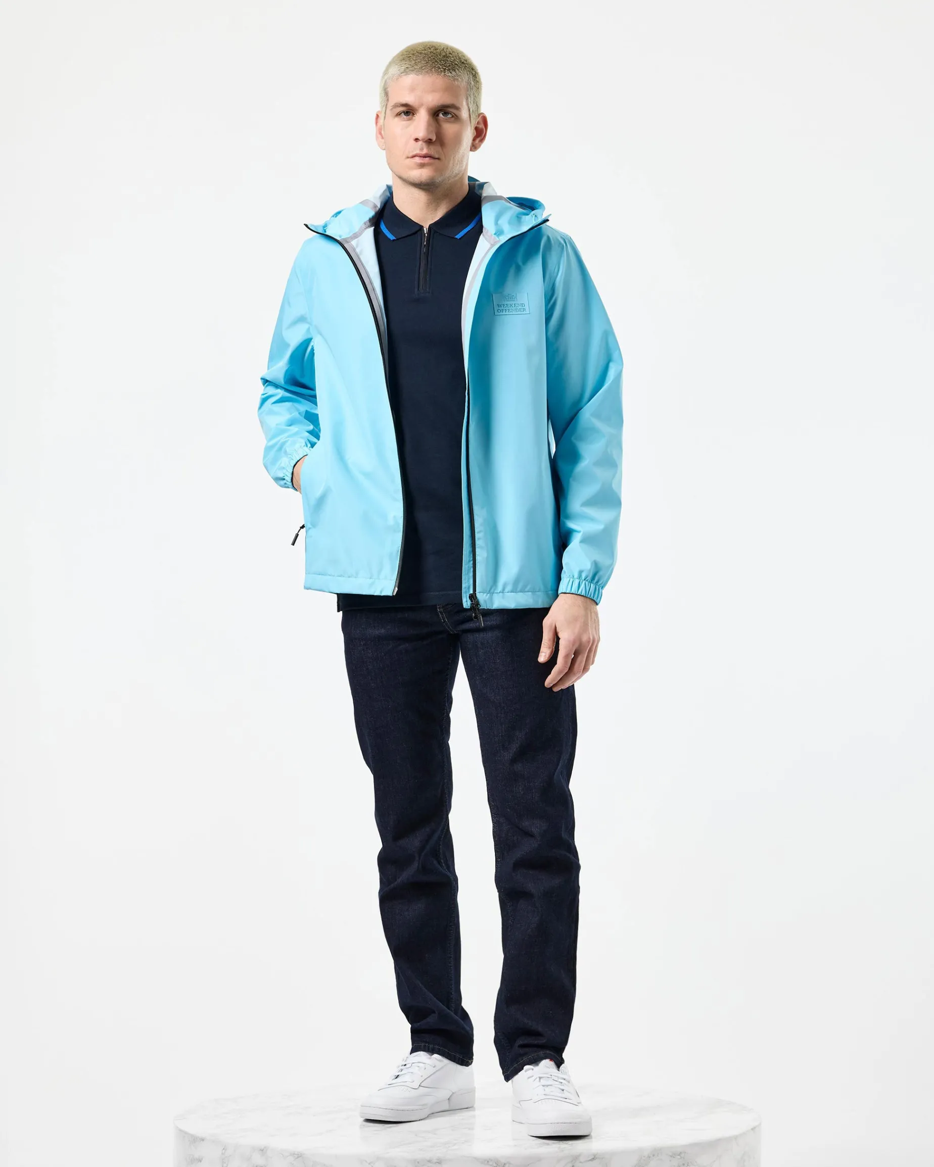 Football + Festivals Waterproof Pack Away Jacket Ocean Wave Blue