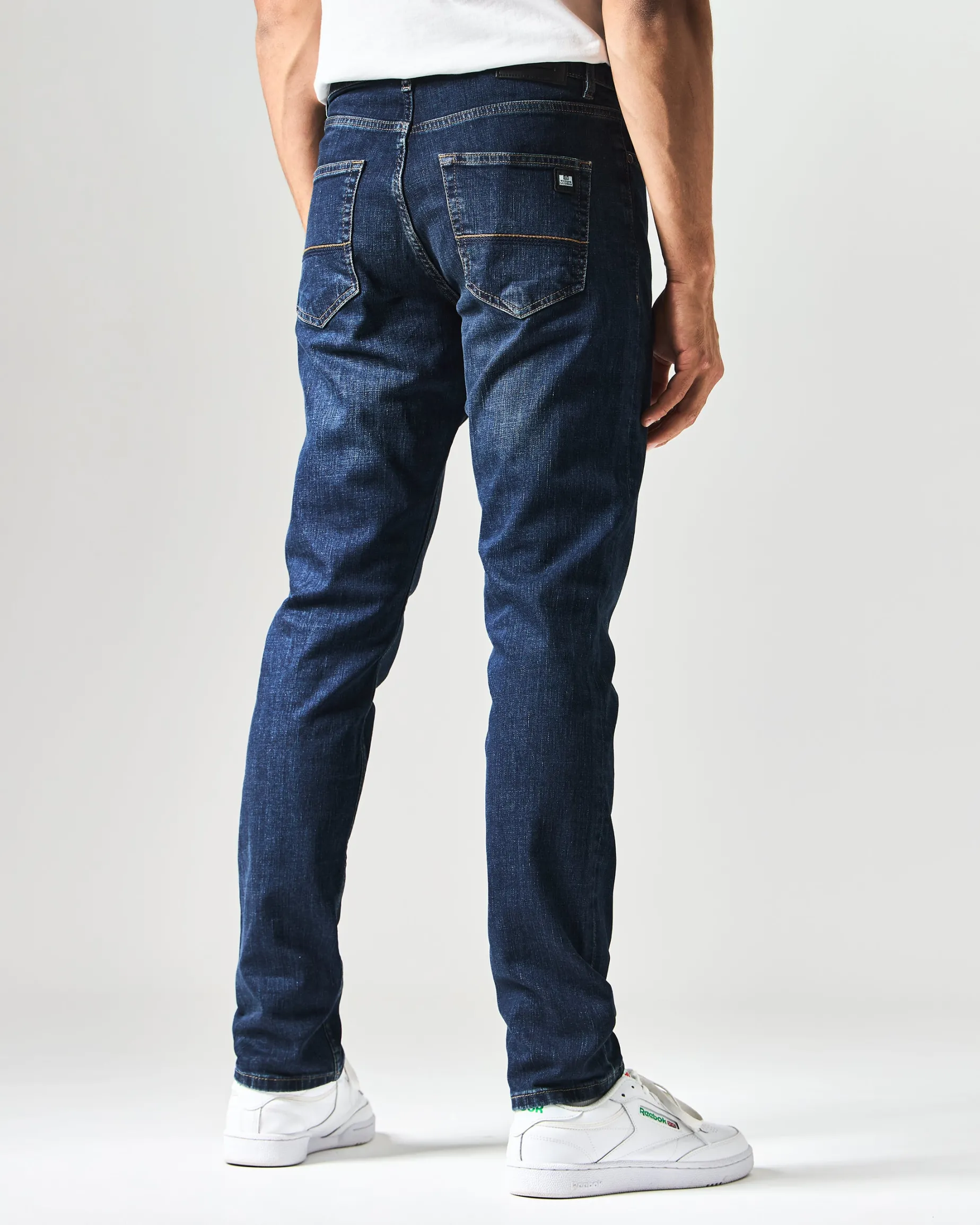 444 Tapered Dark Vintage Denim Jeans