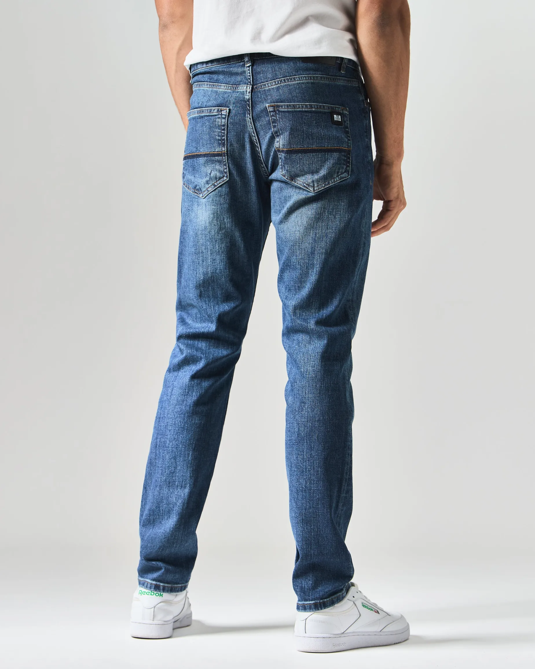 444 Tapered Washed Vintage Denim Jeans